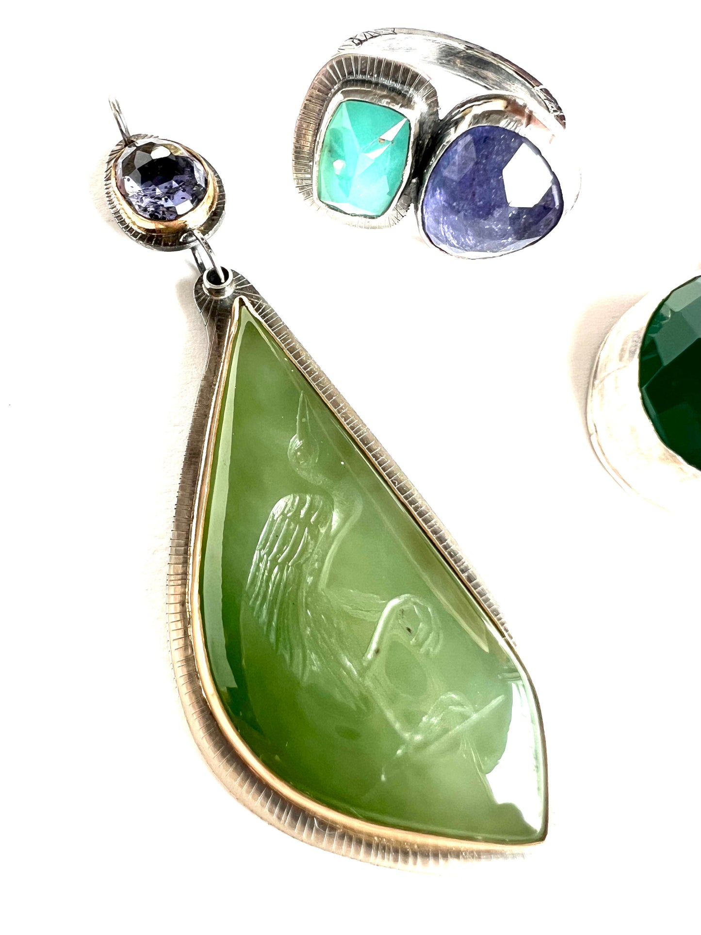 magic jade and iolite talisman made in gold and sterling silver one of a kind